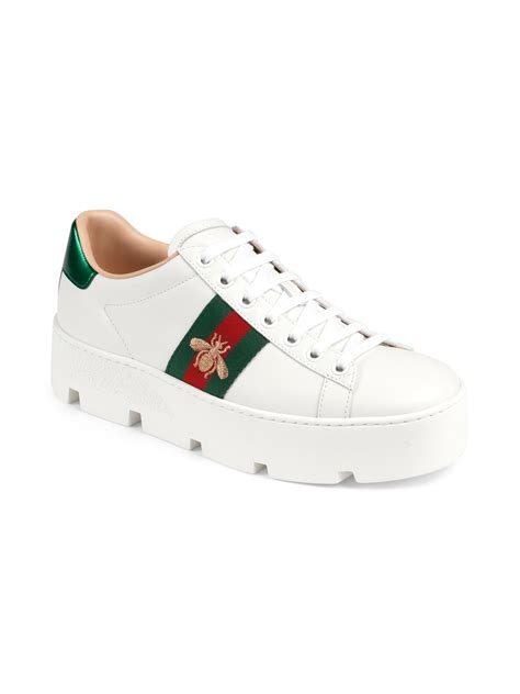 gucci bee platform sneakers.